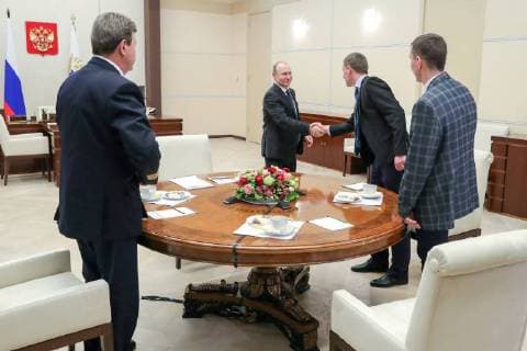 MOSCOW REGION, RUSSIA â€“ FEBRUARY 14, 2018: Russia s President Vladimir Putin (back) meets with Nikolai Izosimov, head of Aeroflot s flight training division in Moscow and winner of the Mentor of the Year award, Atommash welders Dmitry Kucheryavin and Alexander Duimamet, winners of the Mentor of the Champions award, at Novo-Ogaryovo residence. Mikhail Klimentyev Russian Presidential Press and Information Office TASS  TS073D5A