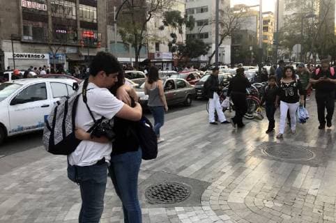 (180217) -- MEXICO CITY, Feb. 17, 2018 -- Image taken with a mobile device shows people gathering on a street after a tremor was felt in Mexico City, capital of Mexico, on Feb. 16, 2018. A 7.1-magnitude earthquake hit Mexico at 7:39 a.m. Saturday (Beijing Time), according to the China Earthquake Networks Center (CENC). ) (gj) MEXICO-MEXICO CITY-QUAKE LixWenqing 