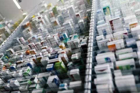 Medicine in shelves in commissioning machine in pharmacy property released  MFF04361
