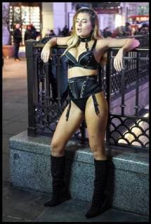 . 26 02 2018. London, United Kingdom. Beast from the East - London Weather. A model wearing only lingerie braves the freezing weather to pose for a film crew in London s Piccadilly Circus.  xPetexMaclainex xi-Imagesx IIM-17072-0013