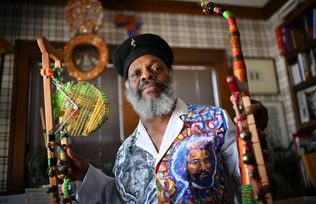 February 9, 2018 - Minneapolis (55407, MN - Minnesota, USA - Douglas Ewart with some of the instruments he made. GLEN STUBBE ¢ glen.stubbe@startribune.com Friday, February 9, 2018 Douglas Ewart wears a jacket painted with his heroes Harriett Tubman, Frederick Douglass and John Brown. It was painted by friend Arthur Wright. Feature on Douglas Ewart, a past president of the highly influential Association for the Advancement of Creative Artists (AACM) out of Chicago, who moved up here decades ago and has kept his hand in both the local and national jazz scenes. Ewart makes his own instruments, plays reeds and percussion and is highly connected. In fact he is the organizer behind the Sonic Universe gig at the Walker March 3. it includes Wadada Leo Smith, the most highly decorated jazz musicians of the past 3-4 years, as well as - ZUMAm42_ 20180209_zaf_m42_010 Copyright: xGlenxStubbex
