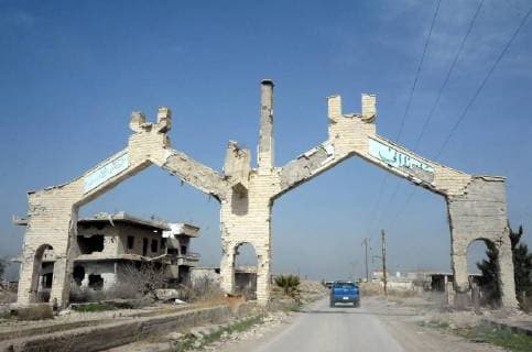 (180305) -- DAMASCUS, March 5, 2018 -- Photo taken on March 4, 2018 shows the entrance of the recently liberated Nashabiyeh town in the rebel-held Eastern Ghouta region, eastern countryside of Damascus, capital of Syria, on March 4, 2018. Syria s national TV said Sunday that the rebels in the capital Damascus Eastern Ghouta area are collapsing as a result of the Syrian military offensive in that area. ) (srb) SYRIA-DAMASCUS-EASTERN-GHOUTA-LIBERATED TOWN AmmarxSafarjalani 