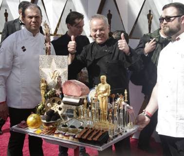 Chef Wolfgang Puck gives a thumbs up as he arrives on the red carpet for the 90th annual Academy Awards at the Dolby Theatre in the Hollywood section of Los Angeles on March 4, 2018.  LAP20180304003 JOHNxANGELILLO