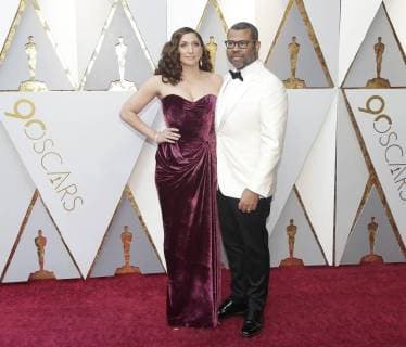 Actress Chelsea Peretti (L) and director Jordan Peele arrive on the red carpet for the 90th annual Academy Awards at the Dolby Theatre in the Hollywood section of Los Angeles on March 4, 2018.  LAP20180304045 JOHNxANGELILLO