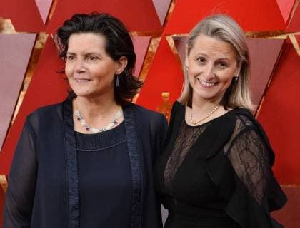 Film editor Tatiana S. Riegel and guest arrive on the red carpet for the 90th annual Academy Awards at the Dolby Theatre in the Hollywood section of Los Angeles on March 4, 2018.  LAP20180304348 JIMxRUYMEN