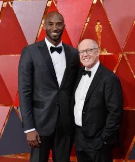 Basketball player Kobe Bryant (L) and director Glen Keane arrive on the red carpet for the 90th annual Academy Awards at the Dolby Theatre in the Hollywood section of Los Angeles on March 4, 2018.  LAP20180304379 JIMxRUYMEN