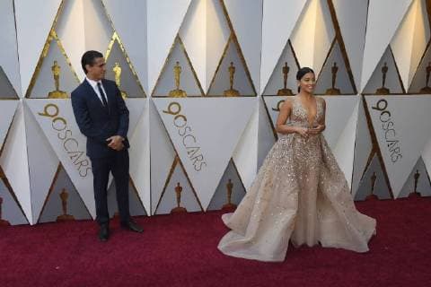 March 4, 2018 - Los Angeles, California, U.S. - JOE LoCICERO AND GINA RODRIGUEZ arrives on the red carpet for the 90th Annual Academy Awards at the Dolby Theatre. Los Angeles U.S. - ZUMAz03_ 20180304_zbp_z03_071 Copyright: xKevinxSullivanx