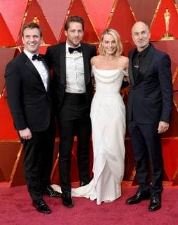 (L-R) Bryan Unkeless, Tom Ackerley, Margot Robbie, and Craig Gillespie arrive on the red carpet for the 90th annual Academy Awards at the Dolby Theatre in the Hollywood section of Los Angeles on March 4, 2018.  LAP20180304950 JIMxRUYMEN