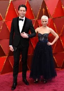 Theo Green (L) and guest arrive on the red carpet for the 90th annual Academy Awards at the Dolby Theatre in the Hollywood section of Los Angeles on March 4, 2018.  LAP201803041054 JIMxRUYMEN