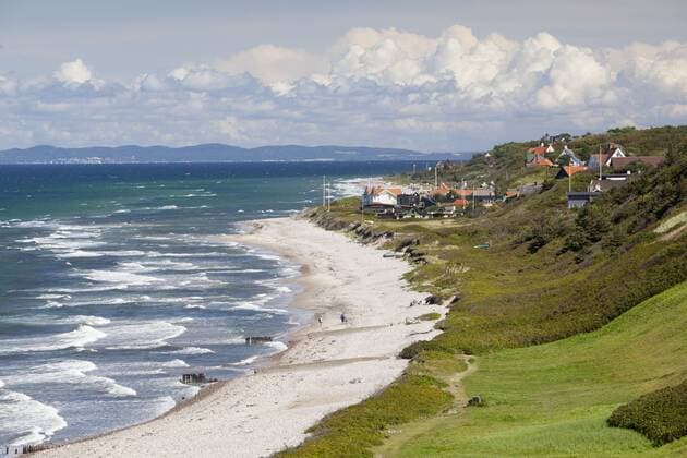 View over Rageleje Strand beach with Swedish coastline in distance, Rageleje, Kattegat Coast, Zealand, Denmark, Scandinavia, Europe Copyright: StuartxBlack 846-2785