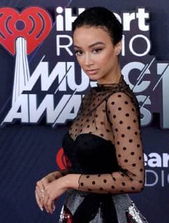 Media personality Draya Michelle arrives for the iHeartRadio Music Awards at The Forum in Inglewood, California on March 11, 2018. Turner s TBS, TNT, and truTV channels broadcasted the ceremony live from The Forum.  LAP20180311077 JIMxRUYMEN