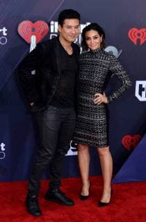 Mario Lopez and Courtney Laine Mazza arrive for the iHeartRadio Music Awards at The Forum in Inglewood, California on March 11, 2018. Turner s TBS, TNT, and truTV channels broadcasted the ceremony live from The Forum.  LAP20180311177 JIMxRUYMEN