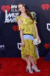 Musical artist Caroline Roman arrives for the iHeartRadio Music Awards at The Forum in Inglewood, California on March 11, 2018. Turner s TBS, TNT, and truTV channels broadcasted the ceremony live from The Forum.  LAP20180311290 JIMxRUYMEN