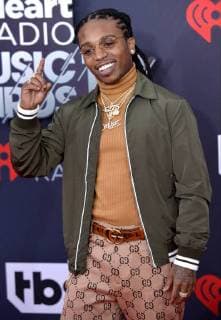 Singer Jacquees arrives for the iHeartRadio Music Awards at The Forum in Inglewood, California on March 11, 2018. Turner s TBS, TNT, and truTV channels broadcasted the ceremony live from The Forum.  LAP20180311293 JIMxRUYMEN