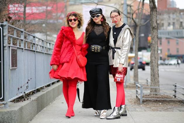 Courtney Quinn, Alexandra Dieck, and Caroline Vazzana attending the Leanne Marshall runway show during New York Fashion Week - Feb 14, 2018 - NYFW: Fall 2018 Street Style Day 7, New York City New York United States  Copyright: xZachxChasex h_00487786