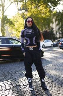 Blogger Aleali May posing outside of the Chanel runway show during Paris Fashion Week - Oct 3, 2017 - PFW: Spring 2018 Street Style Day 8, Paris France  Copyright: xValentinaxRanierix h_00452661