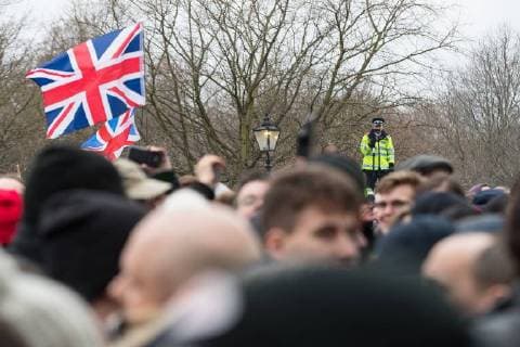 March 18, 2018 - London, London, UK - London , UK . A policeman videos the crowd at Speakers Corner . 1000s including supporters of alt-right groups such as Generation Identity and the Football Lads Alliance , at Speakers Corner in Hyde Park where Tommy Robinson reads a speech by Generation Identity campaigner Martin Sellner . Along with Brittany Pettibone , Sellner was due to deliver the speech last week but the pair were arrested and detained by police when they arrived in the UK , forcing them to cancel an appearance at a UKIP Young Independence youth event , which in turn was reportedly cancelled amid security concerns London UK  - ZUMAl94_ 20180318_zaf_l94_081 Copyright: xJoelxGoodmanx