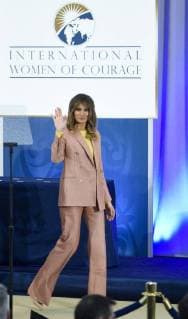 United States First Lady Melania Trump waves as she departs the 2018 International Women of Courage Award Ceremony at the State Department in Washington, DC on March 23, 2018.  WAP20180323901 LEIGHxVOGEL