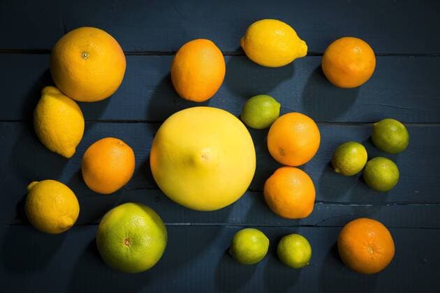 Citrus fruits on dark background  MAEF12512