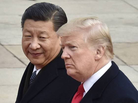 U.S. Pres. Trump and Chinese Pres. Xi File photo taken in November 2017 shows U.S. President Donald Trump (R) and Chinese President Xi Jinping attending a welcome ceremony in Beijing. Trump announced tariffs on $60 billion of imports from China on March 22, 2018, in response to what he sees as China s unfair trade and investment practices. 