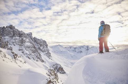 Austria, Tyrol, Kalkkoegel, Axamer Lizum, freeride skier looking into the valley at sunset model released Symbolfoto  CVF00142