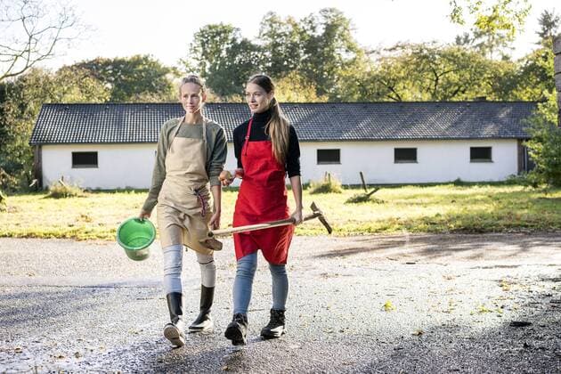 Two women working on a farm model released Symbolfoto property released  PESF00975