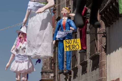 April 1, 2018 - San Miguel De Allende, Guanajuato, Mexico - An effigy of U.S. President Donald Trump hangs in the Plaza Allende with other paper dolls in preparation for the Burning of Judas Easter-time ritual marking the end of Holy Week April 1, 2018 in San Miguel de Allende, Mexico. While the tradition includes burning a paper effigy of Judas a recent popular addition has been paper doll caricatures of Donald Trump across Mexico. San Miguel De Allende Mexico - ZUMAe02_ 20180401_zaf_e02_007 Copyright: xRichardxEllisx