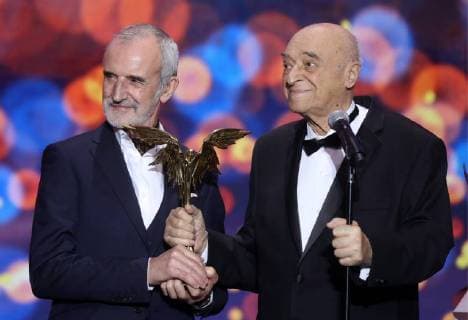 MOSCOW REGION, RUSSIA â€“ APRIL 1, 2018: Vakhtangov Theatre s Artistic Director Rimas Tuminas (L) and actor Vladimir Etush, the winner of a special prize Honour and Dignity , at the 31st Nika Film Award Ceremony, at the Vegas City Hall. Vyacheslav Prokofyev TASS  TS07A33C