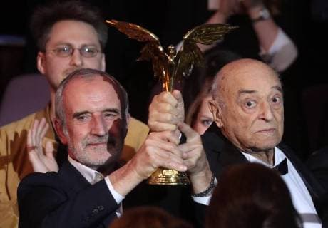 MOSCOW REGION, RUSSIA â€“ APRIL 1, 2018: Vakhtangov Theatre s Artistic Director Rimas Tuminas (L) and actor Vladimir Etush, the winner of a special prize Honour and Dignity , at the 31st Nika Film Award Ceremony, at the Vegas City Hall. Vyacheslav Prokofyev TASS  TS07A33F