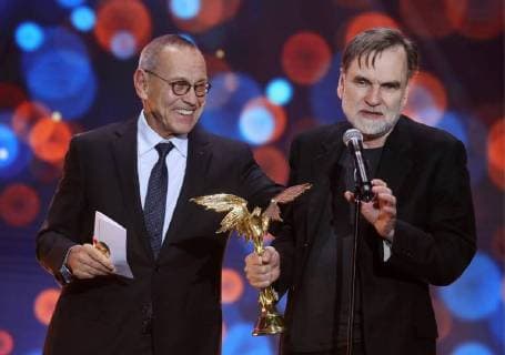 MOSCOW REGION, RUSSIA â€“ APRIL 1, 2018: Film director Andrei Konchalovsky (L) looks on as producer Sergei Selyanov accepts the Best Film award for Boris Khlebnikov s film Arrhythmia at the 31st Nika Film Award Ceremony, at the Vegas City Hall. Vyacheslav Prokofyev TASS  TS07A36B
