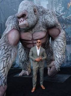 Cast member Dwayne Johnson attends the premiere of the sci-fi motion picture Rampage at the Microsoft Theater in downtown Los Angeles on April 4, 2018. Storyline: The film follows a primatologist who must team-up with George, an albino gorilla who turns into a raging creature of enormous size following a rogue experiment, in order to stop an invasion of monsters.  LAP2018040406 JIMxRUYMEN