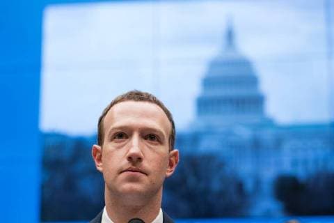 Facebook co-founder and CEO Mark Zuckerberg testifies before a House Energy and Commerce Committee hearing on transparency and use of consumer data on Capitol Hil in Washington, DC on April 11, 2018. The hearing marks Zuckerberg s second day of testimony on Capitol Hill following relevations that millions of Facebook users had their personal information improperly used by Cambridge Analytica, a consulting firm linked to the Trump presidential campaign.  WAS20180411531 ERINxSCHAFF