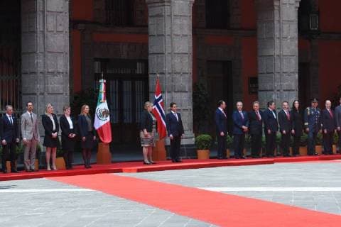 April 12, 2018 - Mexico City, Mexico - Mexican President Enrique Pena Nieto (R) and Norwegian prime Minister Erna Solberg, talk during her welcome ceremony at the National Palace in Mexico City on April 12, 2018. Mexico City Mexico  - ZUMAn230 20180412_zaa_n230_838 Copyright: xCarlosxTischlerx