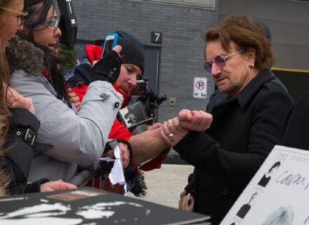 April 14, 2018 - Laval, Quebec, Canada - U2 lead singer BONO meeting his fans at Place Bell Arena. Fans waited up to 8-hrs in freezing temperatures to see their idol. U2 are based in Laval for the next two weeks rehearsing for their Experience + Innocence World Tour 2018 . Laval Canada  - ZUMA 20180414_mda_l128_010 Copyright: xPatricexLapointex