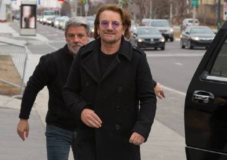April 14, 2018 - Laval, Quebec, Canada - U2 lead singer BONO meeting his fans at Place Bell Arena. Fans waited up to 8-hrs in freezing temperatures to see their idol. U2 are based in Laval for the next two weeks rehearsing for their Experience + Innocence World Tour 2018 . Laval Canada  - ZUMA 20180414_mda_l128_029 Copyright: xPatricexLapointex