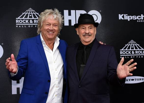John Lodge (L) and Mike Pinder of Moody Blues pose for a photo on the red carpet at the 33rd annual Rock and Roll Hall of Fame induction ceremonies at Public Hall on April 14, 2018 in Cleveland Ohio. Bon Jovi, the Cars and four first-time nominees, including Nina Simone, will be inducted Saturday night as the 2018 Rock & Roll Hall of Fame class.  CLE201804145014 SCOTTxMCKINNEY