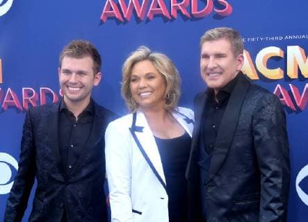 (L-R) Chase Chrisley, Julie Chrisley, and Todd Chrisley attend the 53rd annual Academy of Country Music Awards held at MGM Grand Garden Arena in Las Vegas, Nevada on April 15, 2018. The show will be telecast live on CBS.  LAV20180415017 JIMxRUYMEN