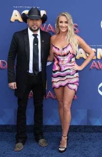 April 15, 2018 - Las Vegas, NV, U.S. - 15 April 2018 - Las Vegas, NV - Jason Aldean, Brittany Kerr. 2018 ACM Awards Red Carpet arrivals at MGM Grand Garden Arena. Photo Credit: MJT AdMedia Las Vegas U.S. - ZUMAa123 20180415_zaa_a123_005 Copyright: xMjtAdmediax