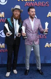 April 15, 2018 - Las Vegas, NV, U.S. - 15 April 2018 - Las Vegas, NV - Brothers Osborne, John Osborne, TJ Osborne. 2018 ACM Awards Red Carpet arrivals at MGM Grand Garden Arena. Photo Credit: MJT AdMedia Las Vegas U.S. - ZUMAa123 20180415_zaa_a123_228 Copyright: xMjtAdmediax