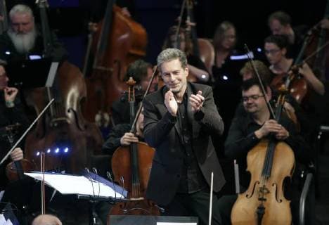 Composer Nic Raine conducts the opening concert of Film Music Prague 2018 GOOSEBUMPS! in Prague, Czech Republic, April 19, 2018. (CTKxPhoto MichaelaxRihova) CTKPhotoP201804191007501  mir 8