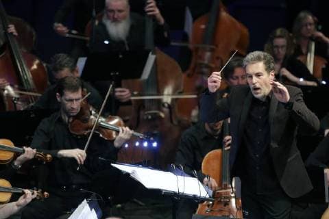 Composer Nic Raine conducts the opening concert of Film Music Prague 2018 GOOSEBUMPS! in Prague, Czech Republic, April 19, 2018. (CTKxPhoto MichaelaxRihova) CTKPhotoP201804191044801  mir 2