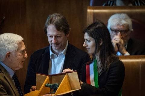 April 21, 2018 - Rome, Lazio, Italy - the Mayor of Rome Virginia Raggi with Deputy Mayor with responsibility for cultural growth Luca Bergamo during the celebration ceremony for the 2771st Christmas in Rome. The celebrations were launched by the Mayor of Rome Virginia Raggi and the President of the Capitoline Assembly Marcello De Vito. Also present were the Deputy Mayor with responsibility for Cultural Growth, Luca Bergamo, the Councillor for Person, School and Community Solidarity, Laura Baldassarre, .The Mayor Virginia Raggi awarded Gigi Proietti the Premio Cultori di Roma 2018 , promoted by the Istituto nazionale di Studi Romani and intended for personalities who have distinguished themselves in their studies and works on Rome.on April 21, 2018 in Rome, Italy Rome Italy - ZUMAn230 20180421_zaa_n230_667 Copyright: xAndreaxRonchinix