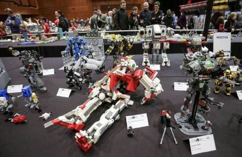 (180421) -- VANCOUVER, April 21, 2018 -- People view LEGO creations at the BrickCan LEGO convention in Vancouver, Canada, April 21, 2018. About 200 LEGO builders across the world showcased more than 6,000 pieces of creations at the annual BrickCan event which is claimed to be Canada s largest public LEGO fan convention. ) CANADA-VANCOUVER-LEGO-EXHIBITION LiangxSen 