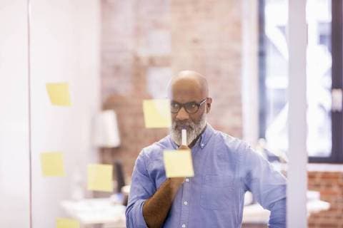 Portrait of pensive businessman in an office model released Symbolfoto property released  FMKF04930