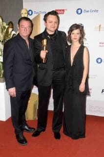 Peter Kurth, Erwin Prib, Preisträger bestes Szenenbild, und Liv Lisa Fries bei der Verleihung des Deutschen Filmpreises 2018 in der Messe Berlin. Berlin, 27.04.2018