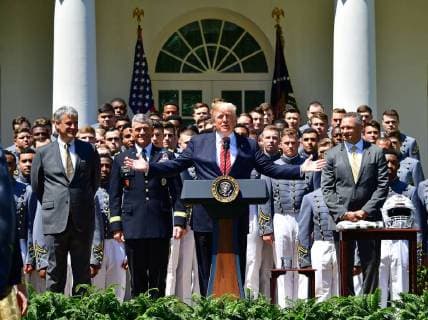 President Donald Trump delivers remarks at a ceremony where he presented the Commander-in-Chief?s Trophy to the U.S. Military Academy football team, in the Rose Garden at the White House in Washington, D.C. on May 1, 2018. The Commander-in-Chief Trophy is presented each year to the season s winner of the American college football competition among the three service academies.  WAP20180501301 KEVINxDIETSCH