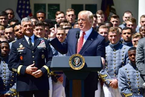 President Donald Trump delivers remarks at a ceremony where he presented the Commander-in-Chief?s Trophy to the U.S. Military Academy football team, in the Rose Garden at the White House in Washington, D.C. on May 1, 2018. The Commander-in-Chief Trophy is presented each year to the season s winner of the American college football competition among the three service academies.  WAP20180501312 KEVINxDIETSCH