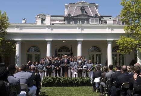 President Donald Trump delivers remarks at a ceremony where he presented the Commander-in-Chief?s Trophy to the U.S. Military Academy football team, in the Rose Garden at the White House in Washington, D.C. on May 1, 2018. The Commander-in-Chief Trophy is presented each year to the season s winner of the American college football competition among the three service academies.  WAP20180501313 KEVINxDIETSCH