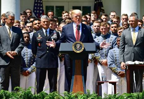 President Donald Trump delivers remarks at a ceremony where he presented the Commander-in-Chief?s Trophy to the U.S. Military Academy football team, in the Rose Garden at the White House in Washington, D.C. on May 1, 2018. The Commander-in-Chief Trophy is presented each year to the season s winner of the American college football competition among the three service academies.  WAP20180501309 KEVINxDIETSCH