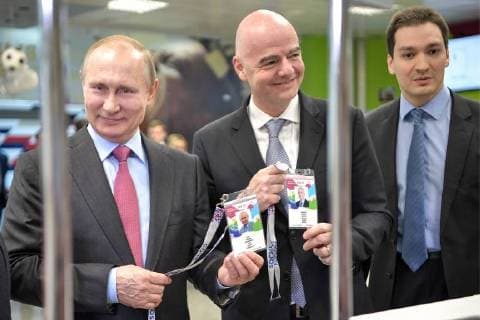 SOCHI, RUSSIA â€“ MAY 3, 2018: Russia s President Vladimir Putin and FIFA President Gianni Infantino (L-R) visit a 2018 FIFA World Cup Fan ID distribution centre. Alexei Nikolsky Russian Presidential Press and Information Office TASS  TS07DEC6